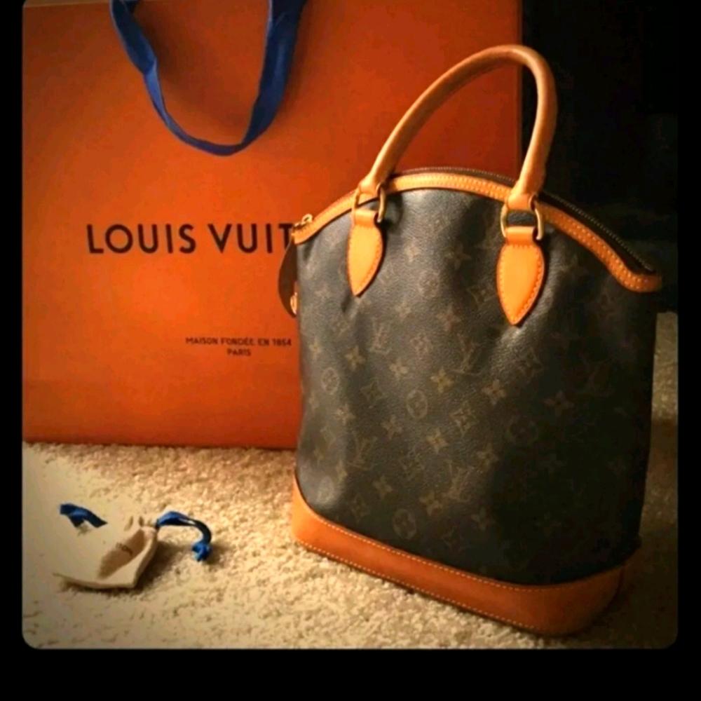 Louis Vuitton P.M. Monagram Lock it bag